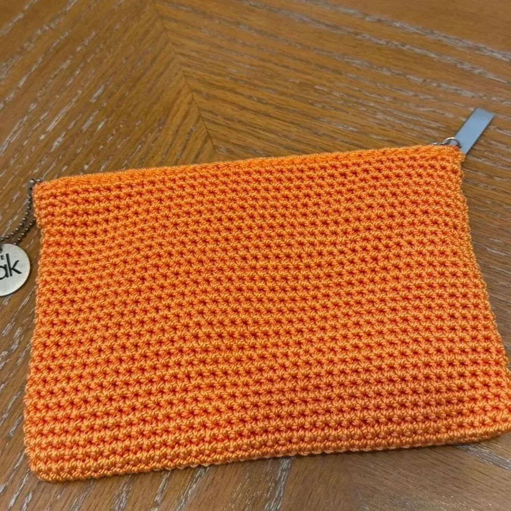 The Sak Crochet Orange Cosmetic Pouch Bag